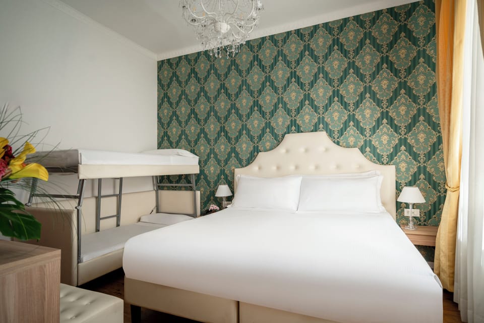 Room, Terrace, City View | Down comforters, minibar, in-room safe, desk