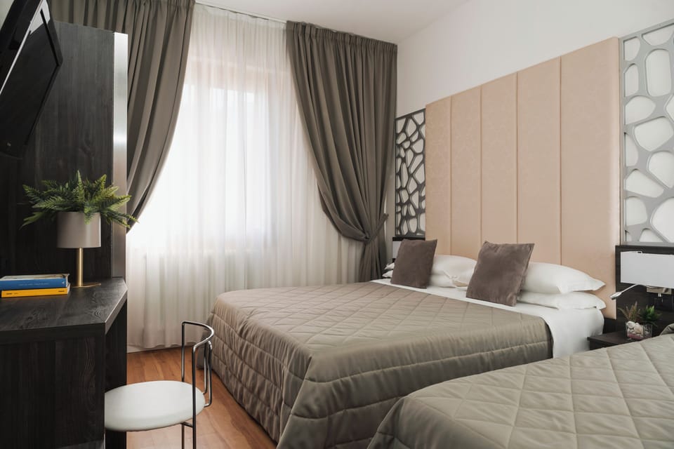 Classic Triple Room | Down comforters, minibar, in-room safe, desk