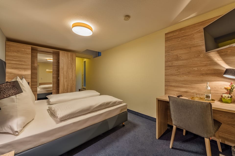 Triple Room | Select Comfort beds, in-room safe, desk, soundproofing