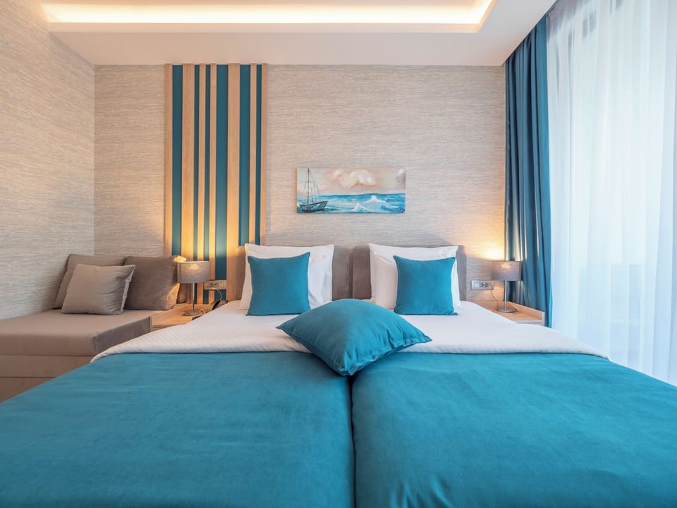 Superior Double or Twin Room | Minibar, in-room safe, blackout drapes, free WiFi