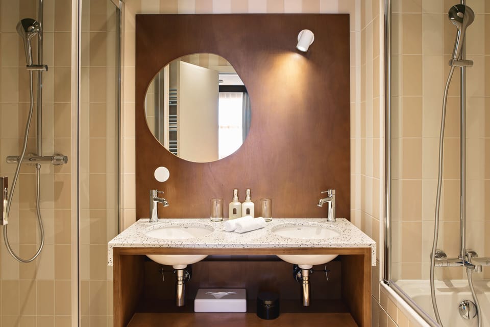 Eco-friendly toiletries, hair dryer, towels, soap