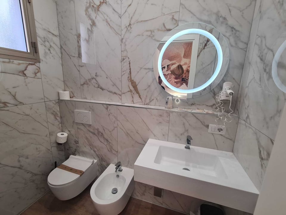 Shower, free toiletries, hair dryer, towels
