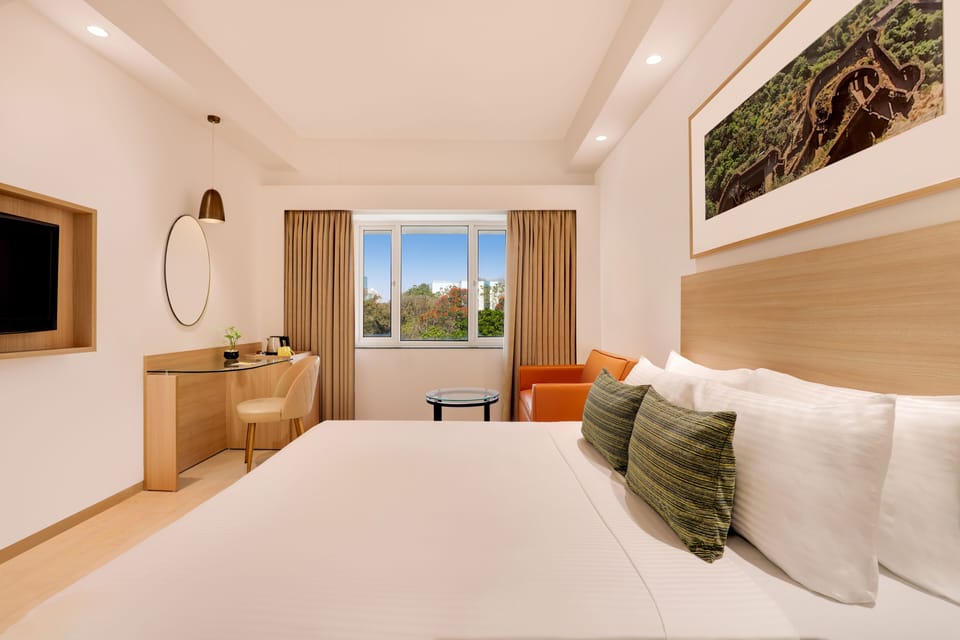 Deluxe Room | Premium bedding, in-room safe, desk, blackout drapes