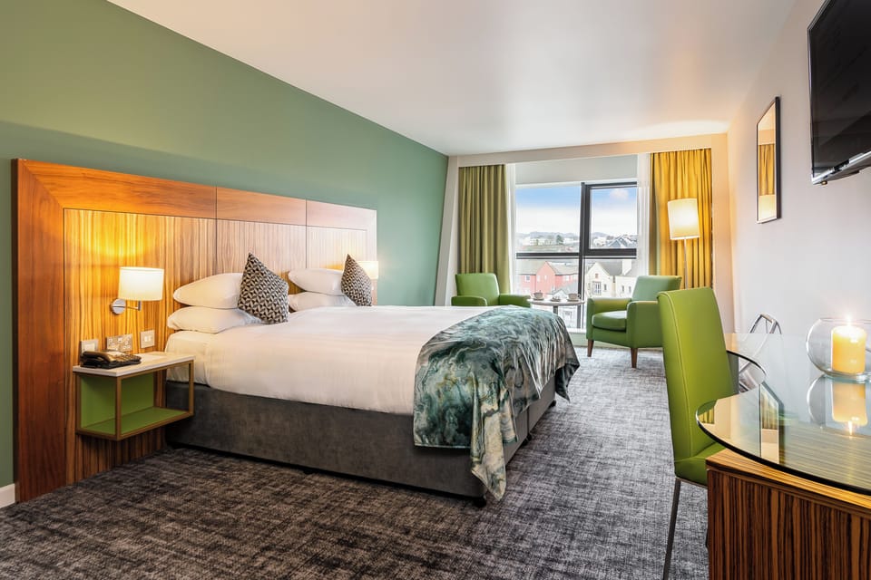 Deluxe Room, River View | Egyptian cotton sheets, premium bedding, memory foam beds, in-room safe