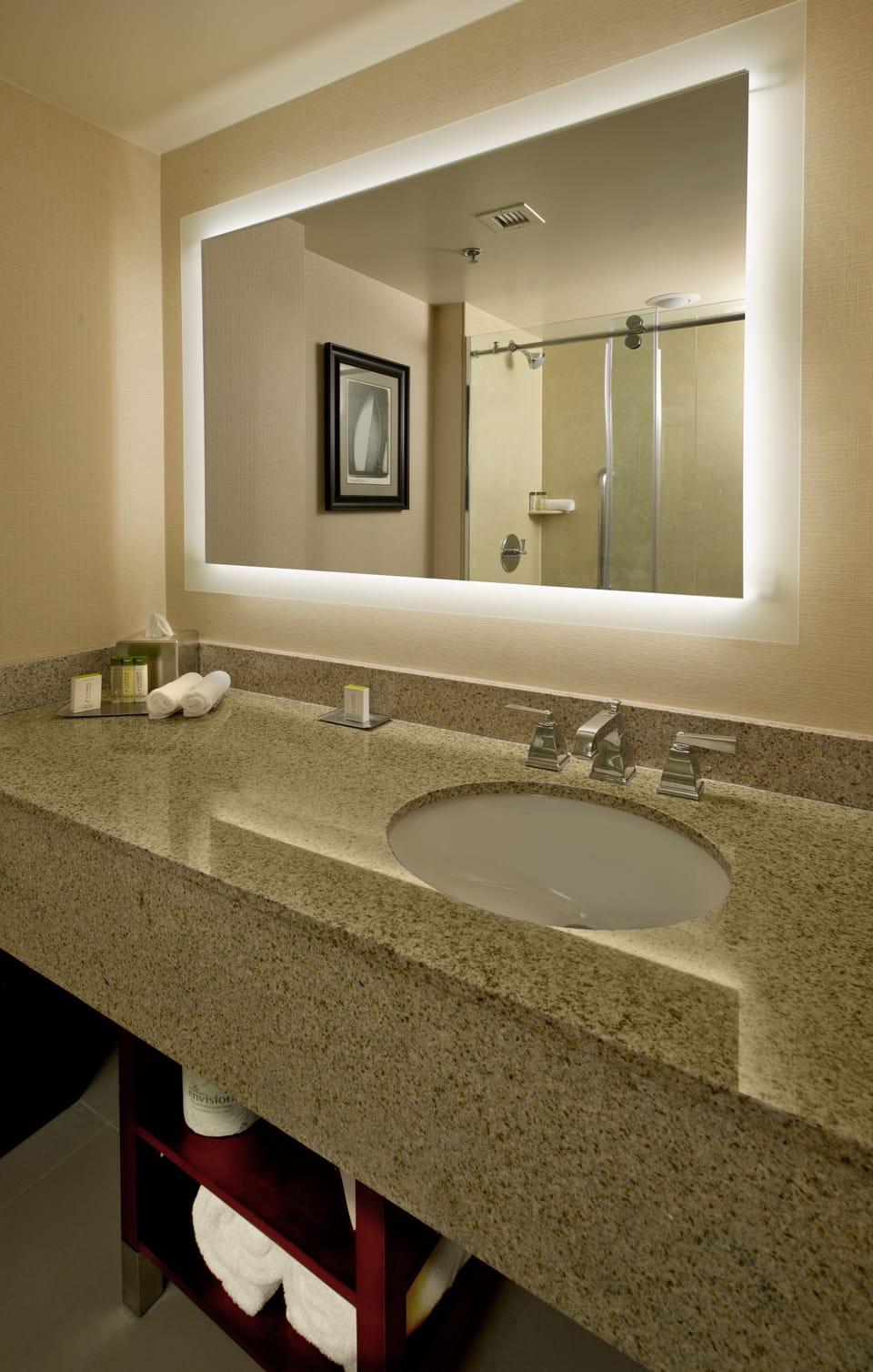 Combined shower/tub, designer toiletries, hair dryer, towels