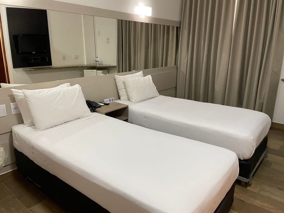 Minibar, desk, blackout drapes, soundproofing