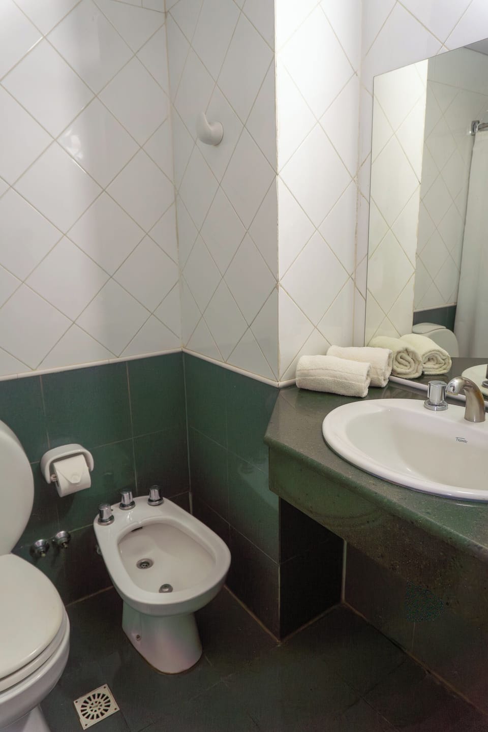 Combined shower/tub, hair dryer, towels, soap