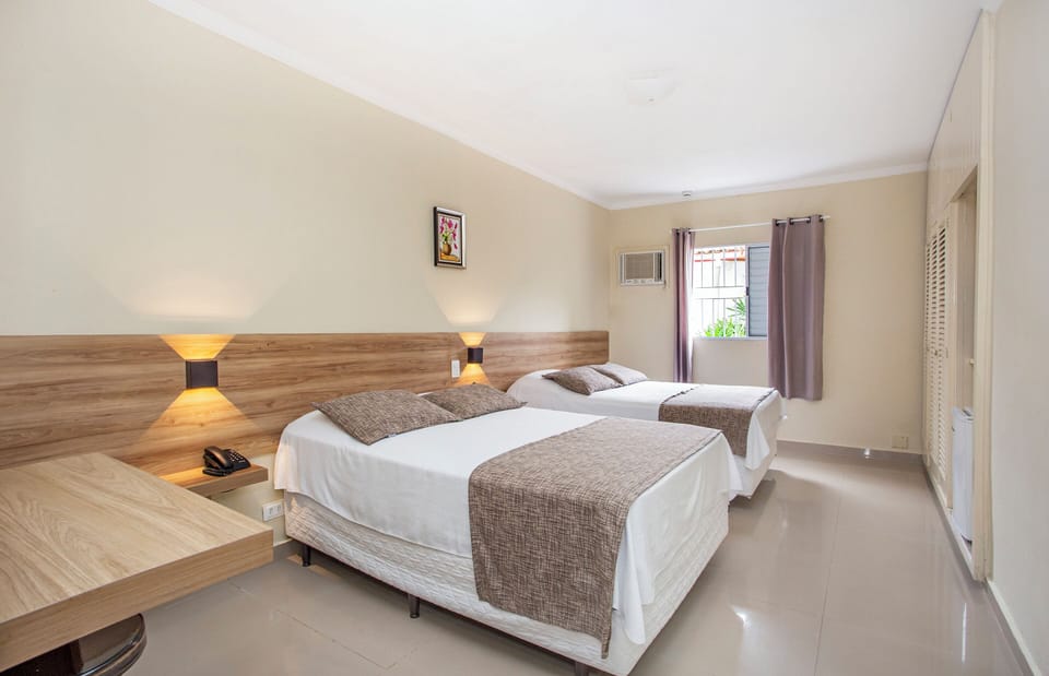 Deluxe Quadruple Room | Courtyard view