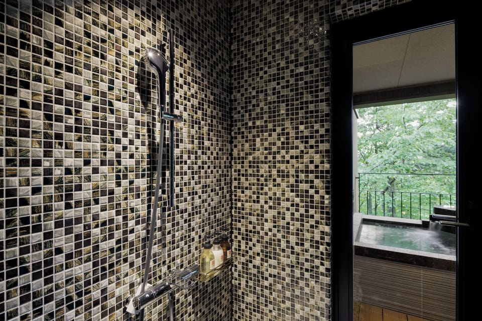 [Garden view] Japanese-Western room with private bath+terrace | Bathroom | Separate tub and shower, free toiletries, hair dryer, slippers
