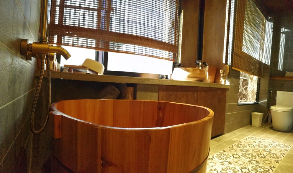 Superior Quadruple Room | Bathroom | Shower, hair dryer, slippers, towels