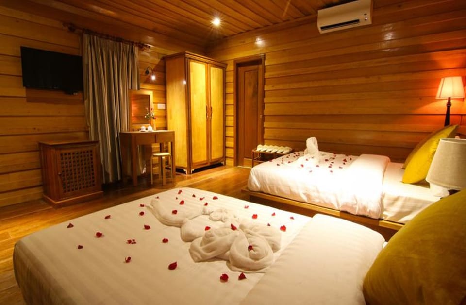 Deluxe Twin Room, Multiple Beds, Balcony, Poolside | Minibar, in-room safe, desk, laptop workspace