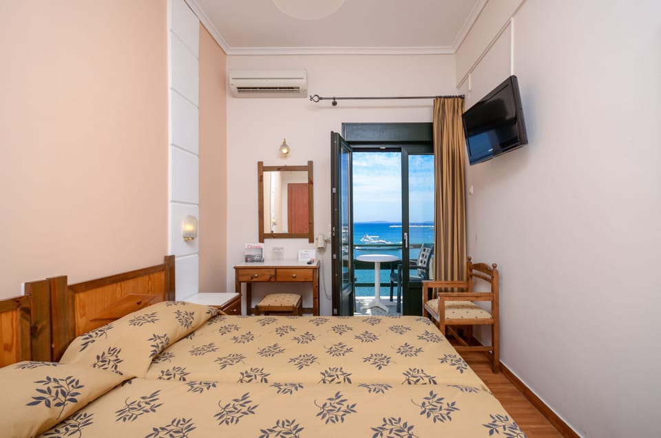 Standard Twin Room (Port View) | Down comforters, desk, iron/ironing board, free WiFi