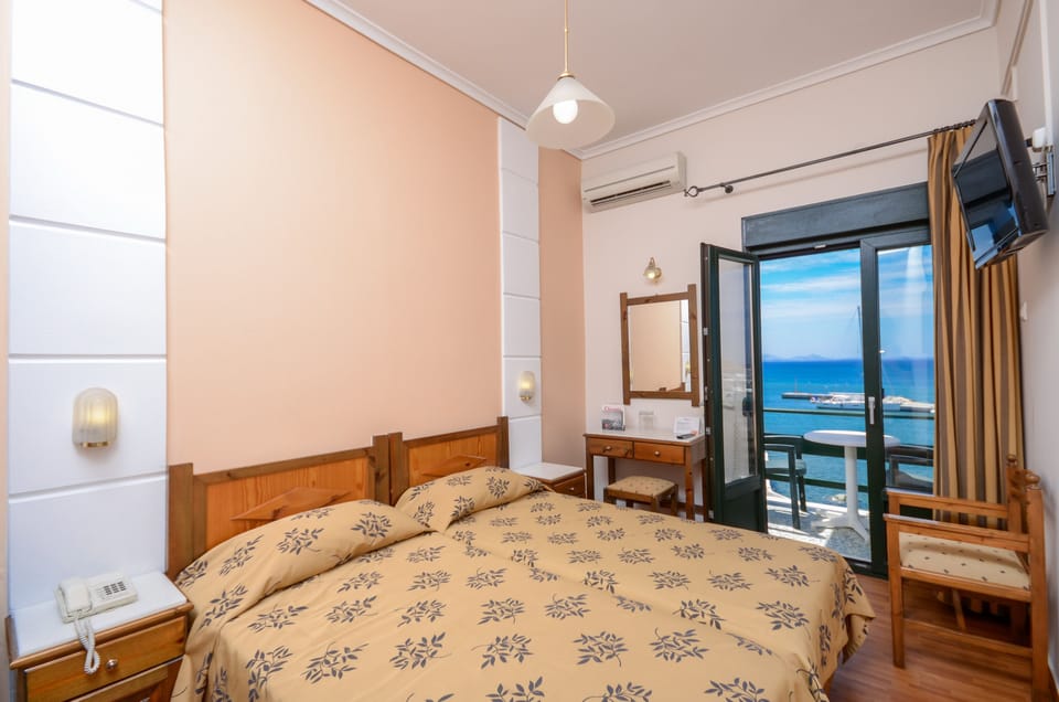 Standard Twin Room (Port View) | Down comforters, desk, iron/ironing board, free WiFi