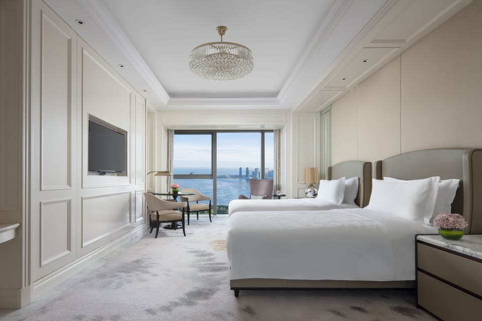 Premium bedding, down comforters, in-room safe, desk