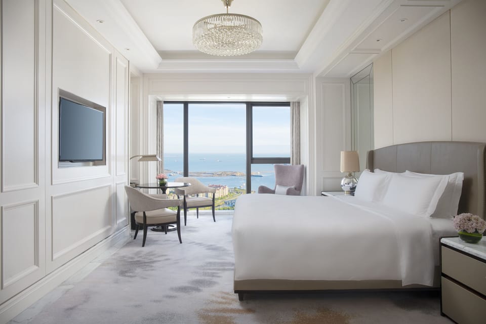 Premium bedding, down comforters, in-room safe, desk