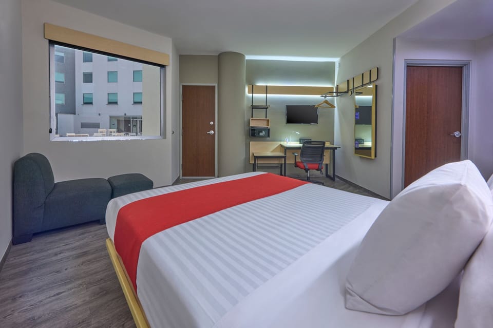 Room, 1 Queen Bed | In-room safe, desk, blackout drapes, iron/ironing board