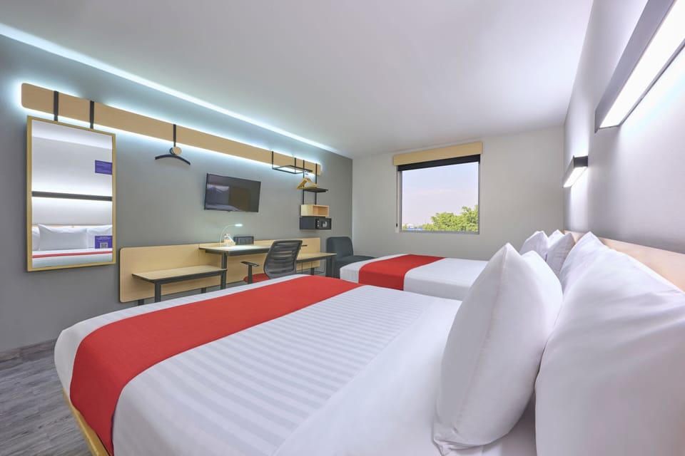 Room, 2 Queen Beds | In-room safe, desk, blackout drapes, iron/ironing board