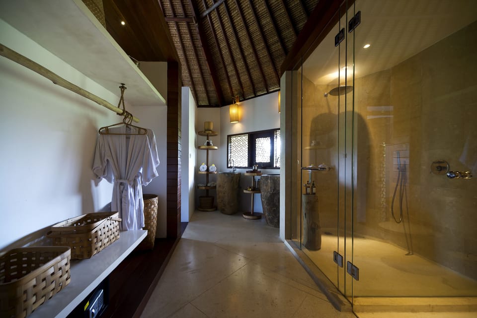 Separate tub and shower, free toiletries, bathrobes, slippers