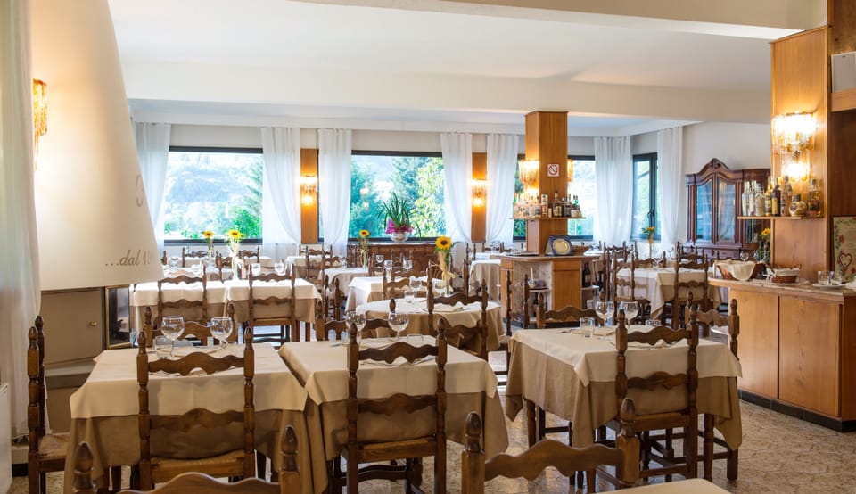 Breakfast, lunch, dinner served; local cuisine, garden views 