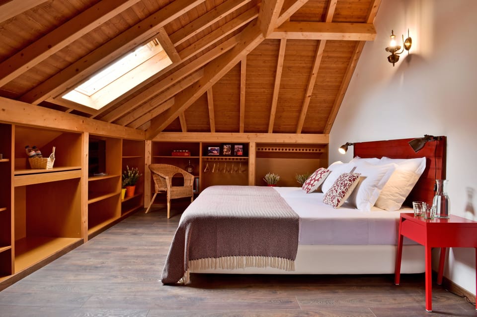 Premium bedding, desk, laptop workspace, blackout drapes