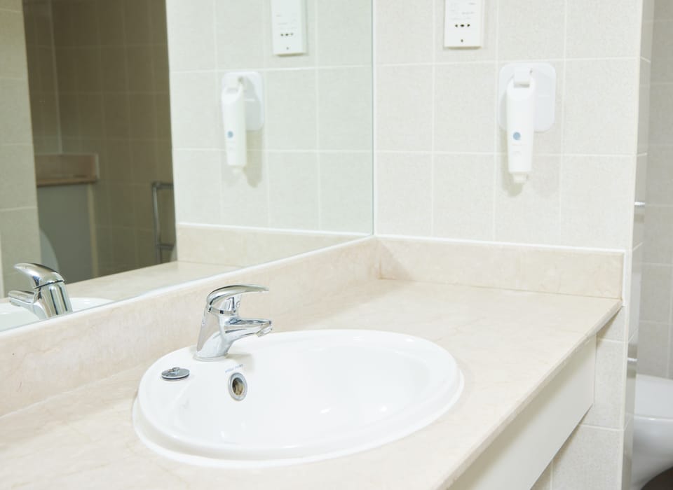 Superior Room | Bathroom | Hair dryer, towels