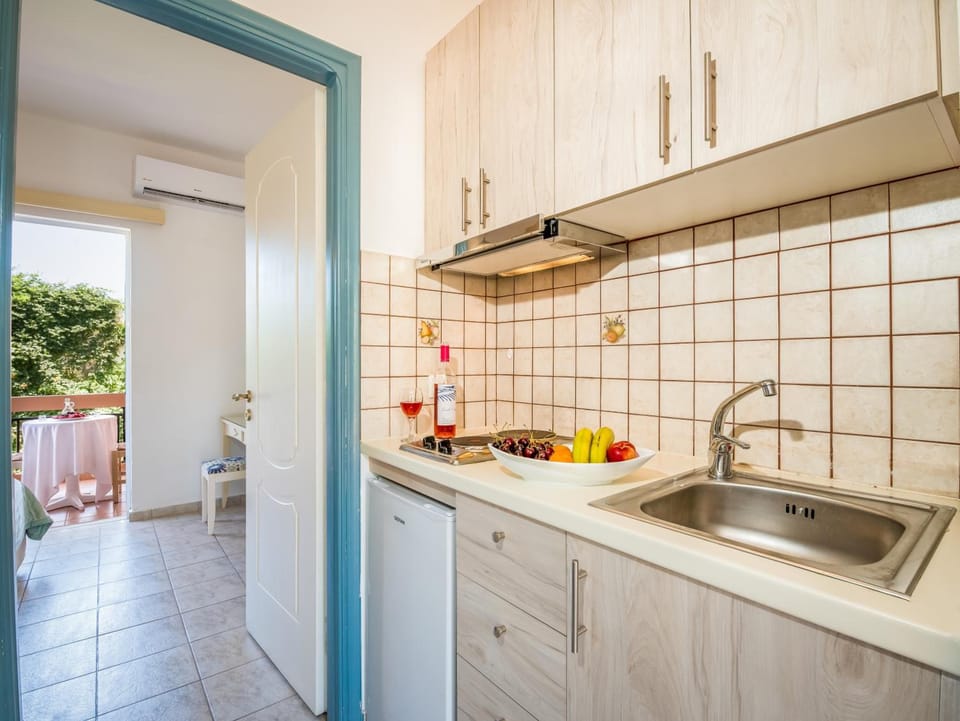 Fridge, stovetop, electric kettle, toaster