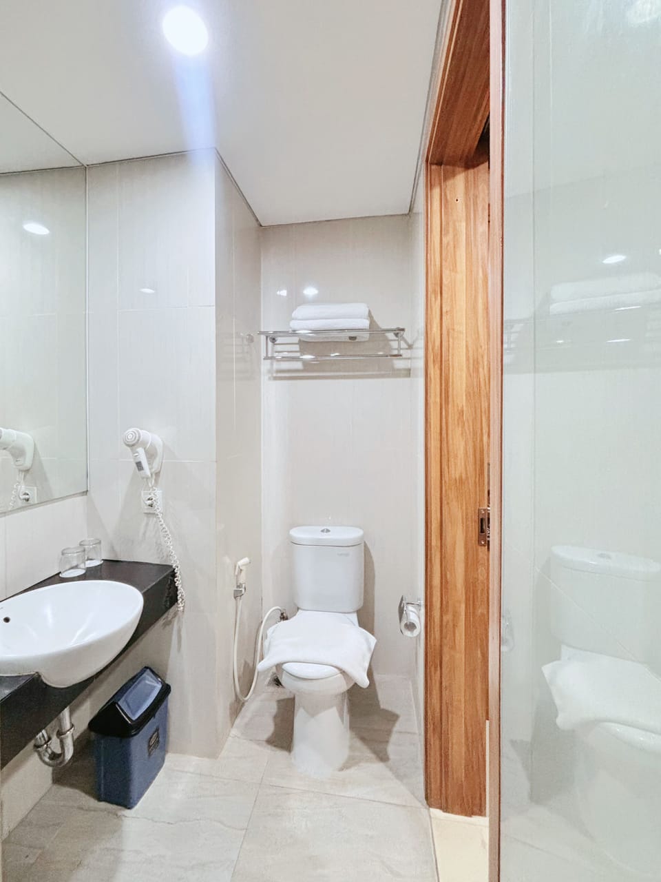 Shower, free toiletries, hair dryer, slippers