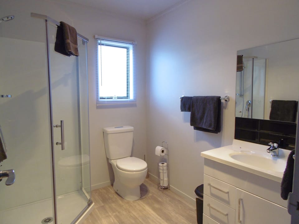 Family Apartment, 2 Bedrooms, Kitchen, Garden Area | Bathroom | Combined shower/tub, rainfall showerhead, towels