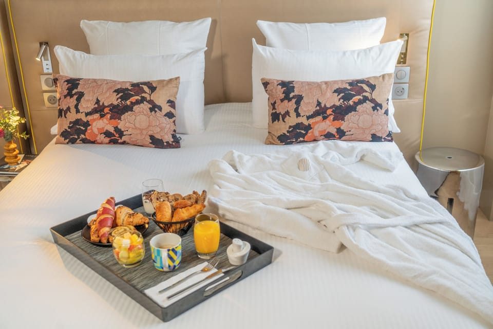 Premium bedding, down comforters, pillowtop beds, in-room safe