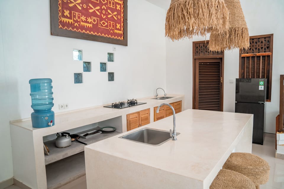 Deluxe Room, 1 Bedroom, Pool View | Living area | 24-inch Smart TV with cable channels