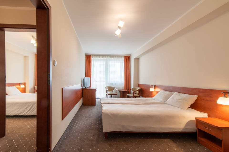 Studio, 2 Bedrooms | Desk, cribs (free), WiFi (free), bed sheets