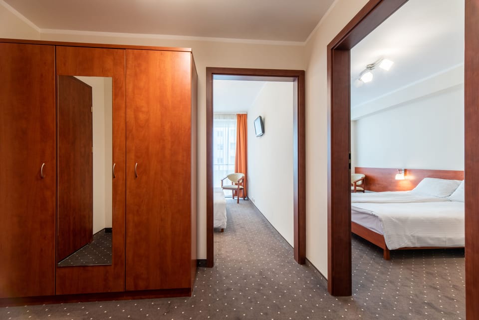 Studio, 2 Bedrooms | Desk, cribs (free), WiFi (free), bed sheets