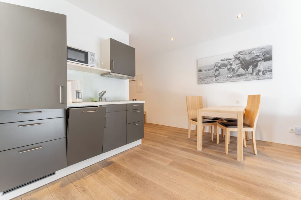 Comfort Apartment, 2 Bedrooms, Balcony, Mountain View | Living area | Smart TV, heated floors