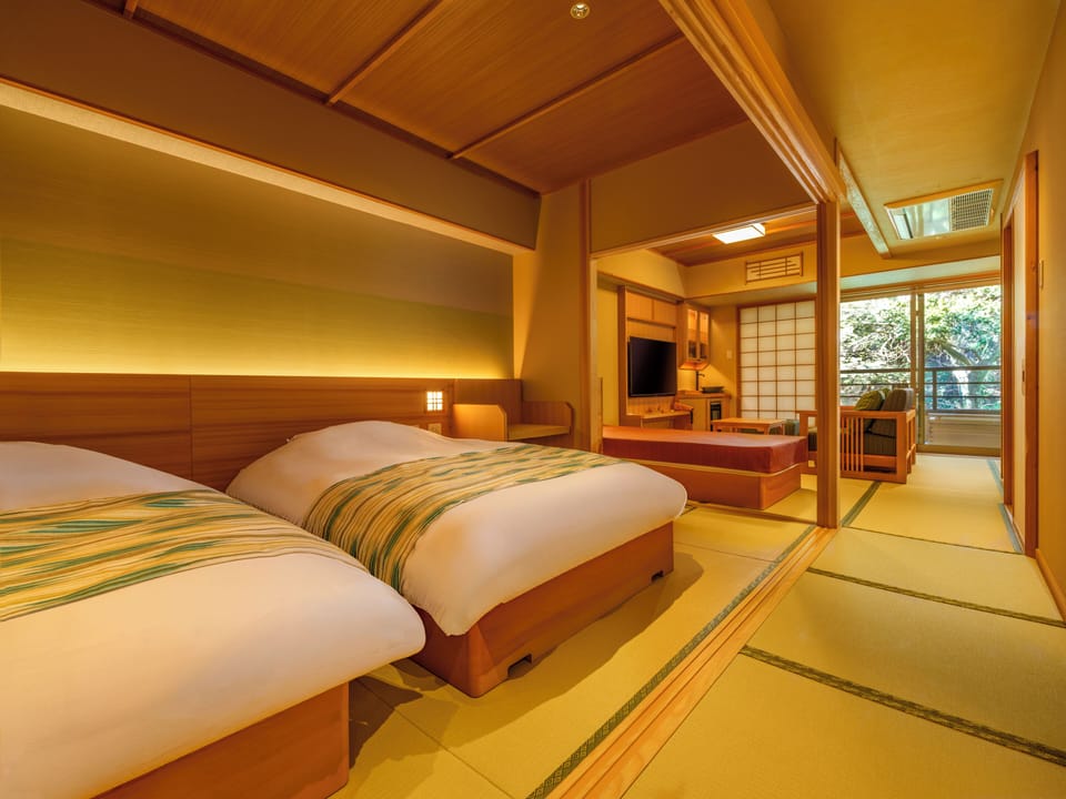 Deluxe Twin Room | Down comforters, in-room safe, free WiFi