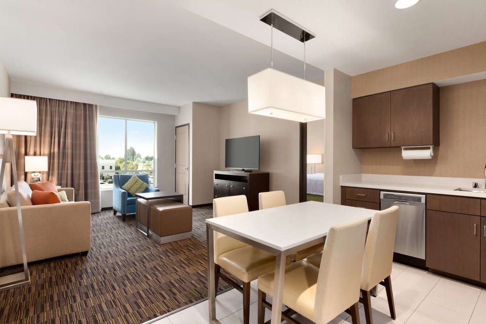 Suite, 2 Bedrooms, Non Smoking | Private kitchen | Full-size fridge, microwave, dishwasher, coffee/tea maker