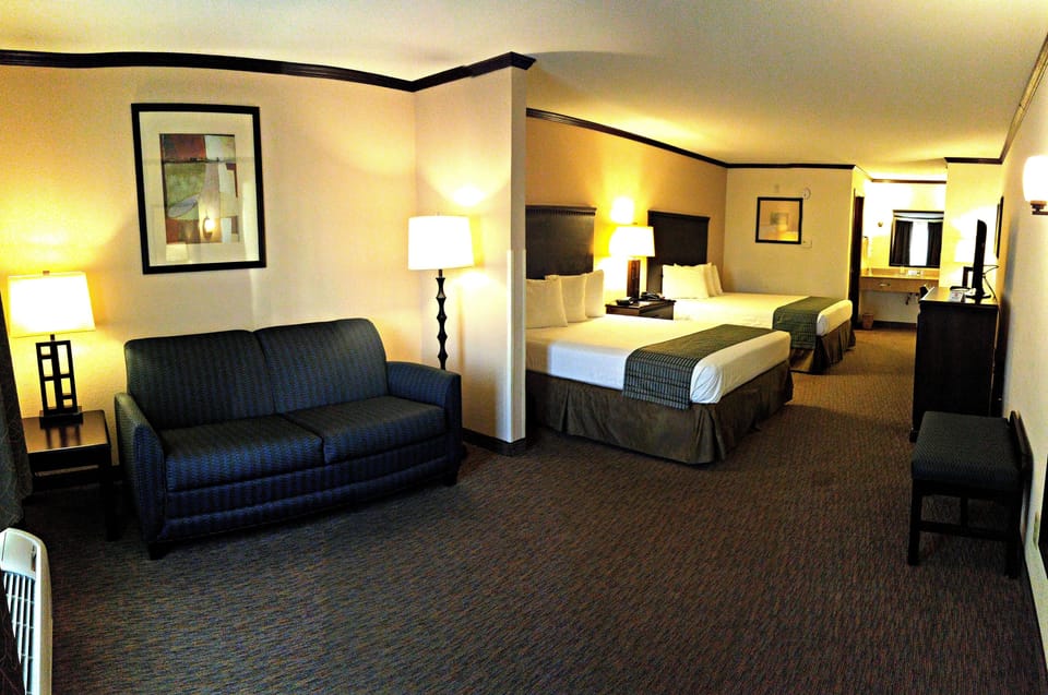 Standard Suite, Multiple Beds | Desk, iron/ironing board, free WiFi, bed sheets