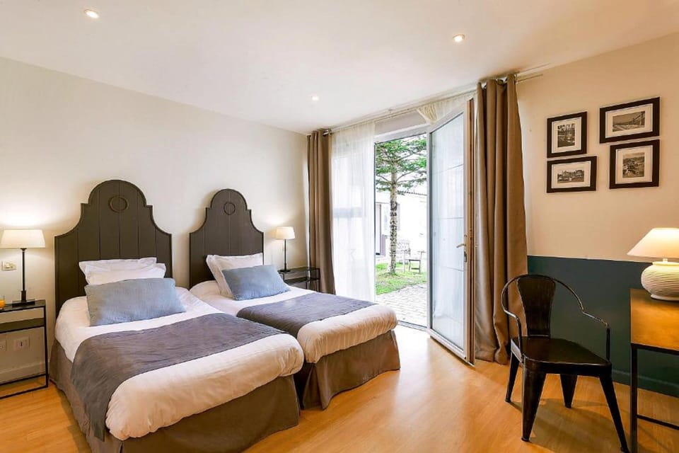 Double confort ou avec lit jumeaux | Minibar, in-room safe, blackout drapes, free WiFi