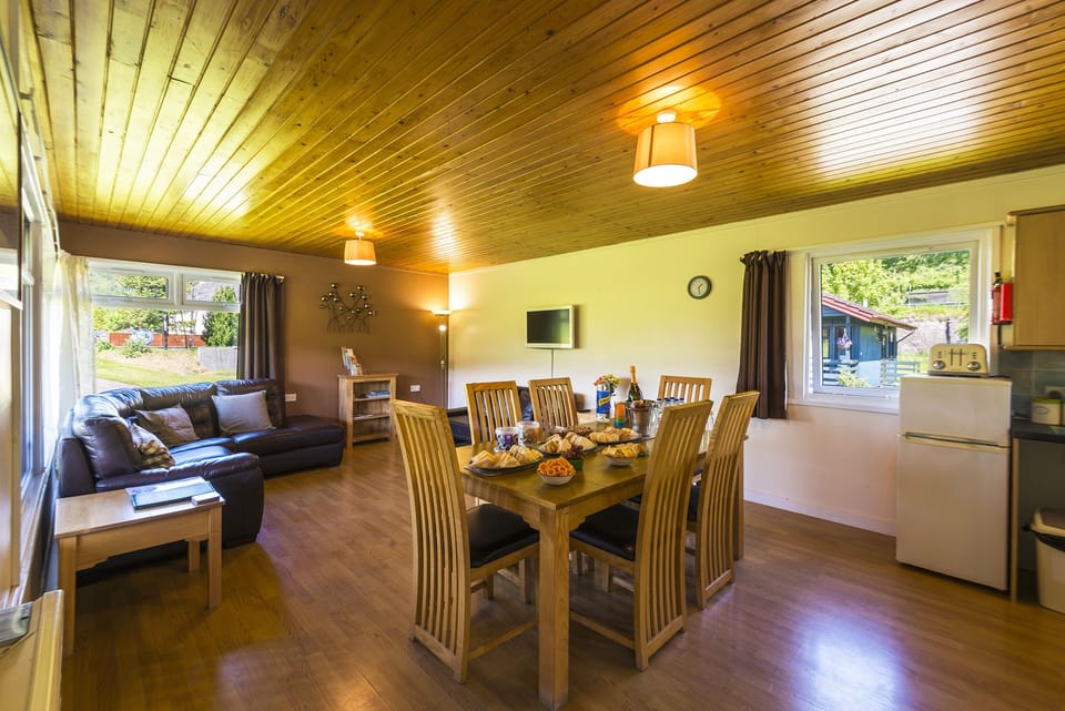 Chalet, Multiple Beds | Living area | Flat-screen TV, DVD player
