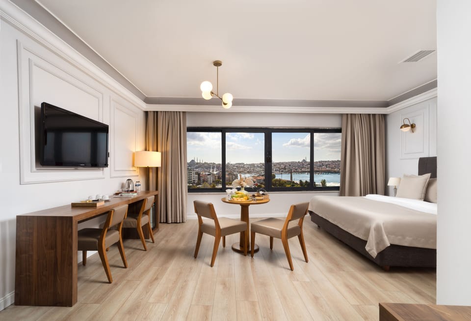 Superior Suite, Sea View | Frette Italian sheets, premium bedding, down comforters, minibar