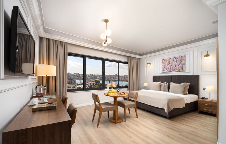 Superior Suite, Sea View | Frette Italian sheets, premium bedding, down comforters, minibar