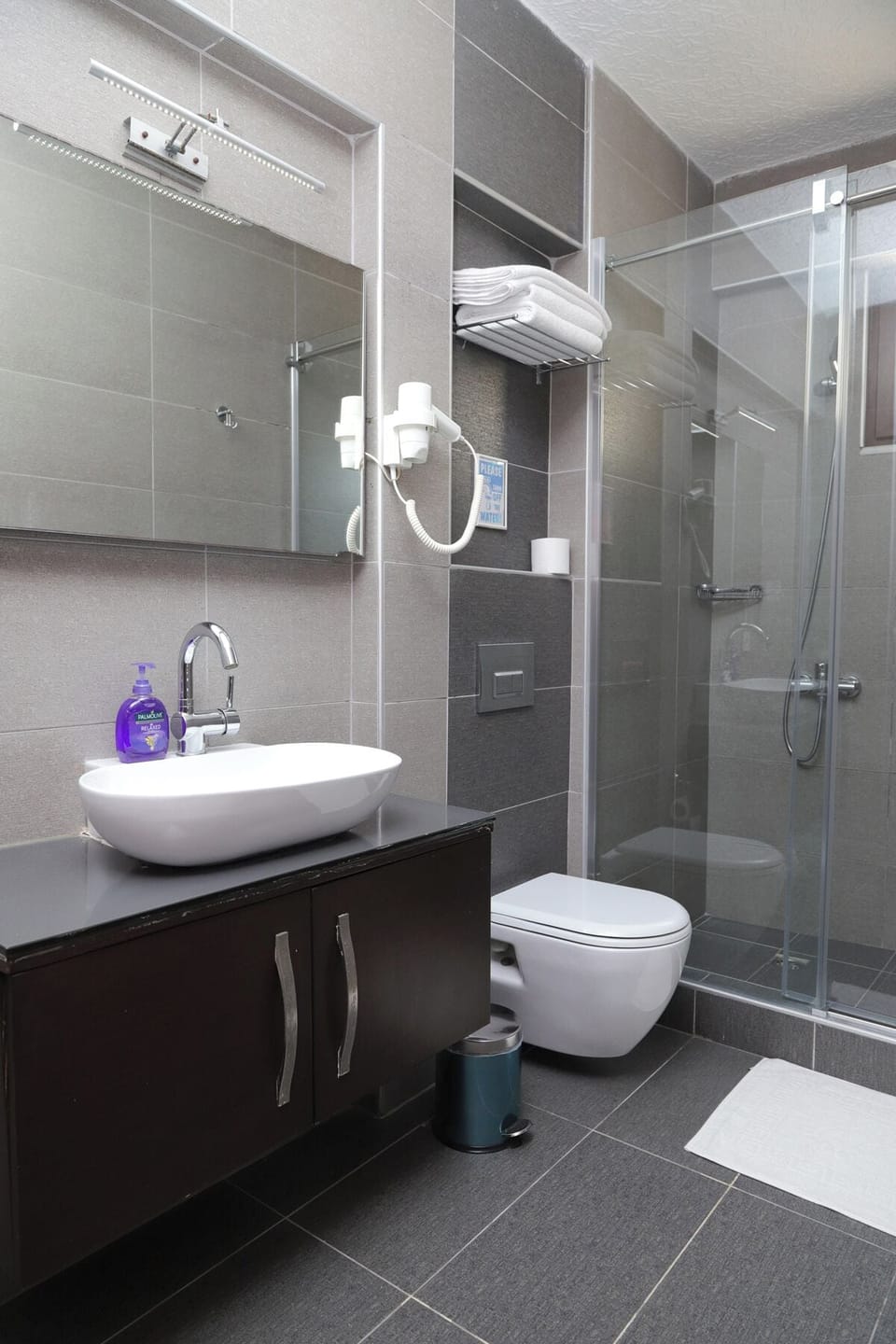Shower, free toiletries, hair dryer, slippers