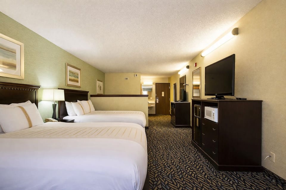 Room, Non Smoking (2 Queen Beds Suite) | In-room safe, desk, iron/ironing board, free WiFi