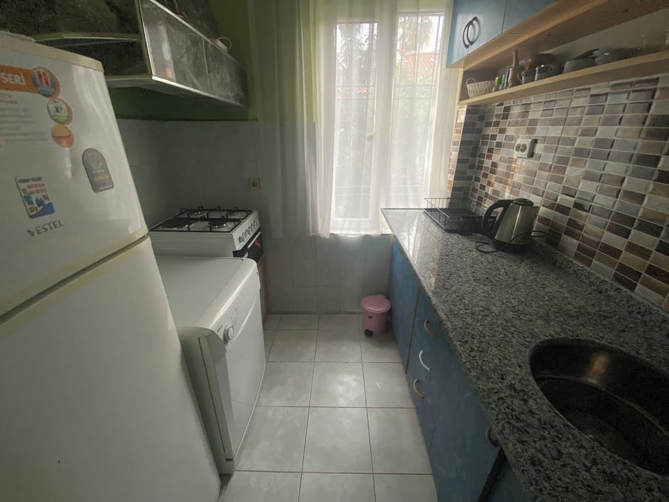 Family Apartment | Private kitchen | Fridge, coffee/tea maker, electric kettle, cookware/dishes/utensils