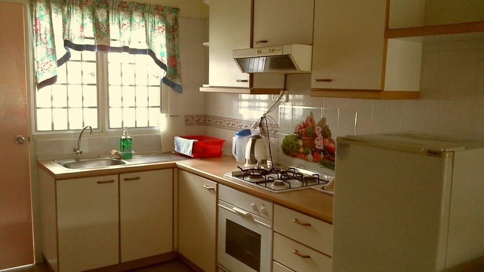 Apartment, 3 Bedrooms | Private kitchenette | Full-size fridge, microwave, stovetop, coffee/tea maker