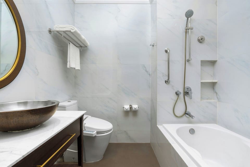 Combined shower/tub, free toiletries, hair dryer, bathrobes
