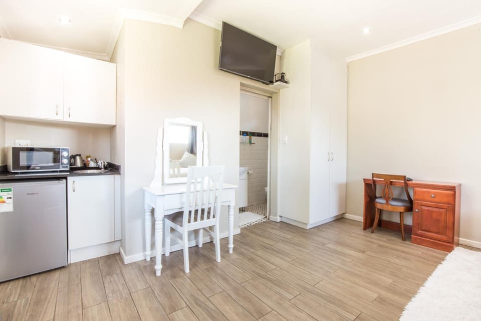 Shared fridge, microwave, coffee/tea maker, electric kettle