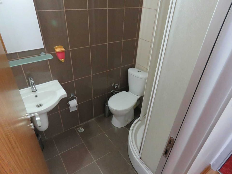 Shower, free toiletries, hair dryer, slippers