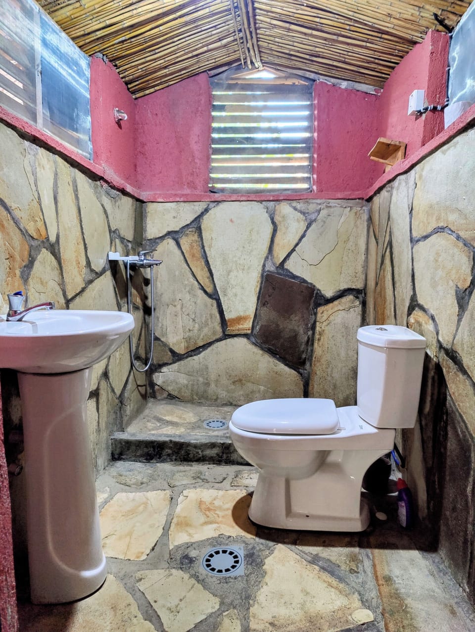 Red Rocks Cottage | Bathroom | Shower, rainfall showerhead, designer toiletries, bathrobes