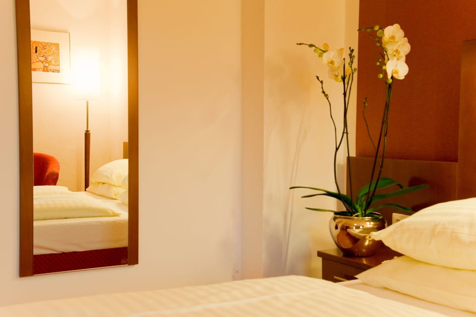 Standard Double Room | Minibar, in-room safe, desk, iron/ironing board (on request)