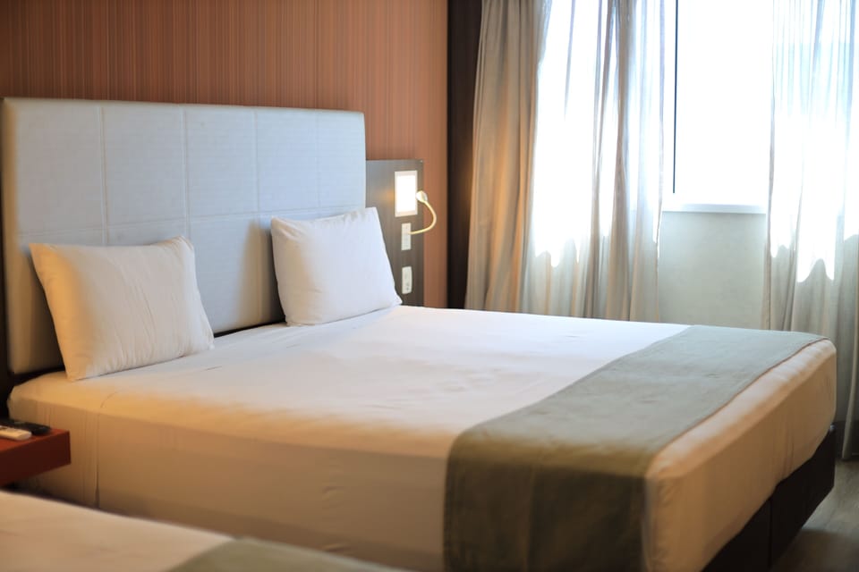 Family Room | Minibar, desk, iron/ironing board, free WiFi
